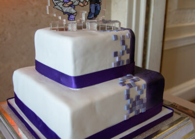 purple and white wedding cake. A fairytale affair in the Derbyshire countryside.