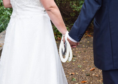 Close-up of bride's intricate wedding jewelry